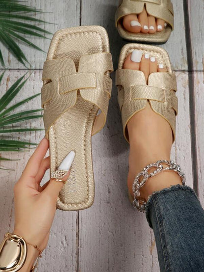 Snakeskin embossed sandals with opening