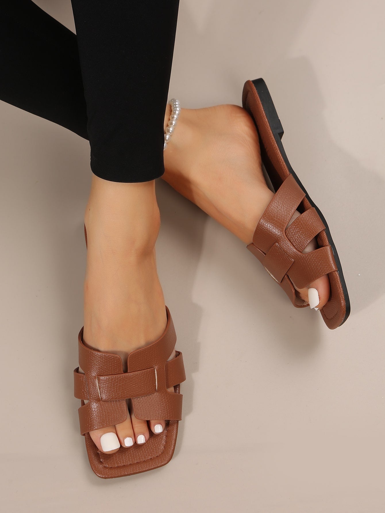 Snakeskin embossed sandals with opening